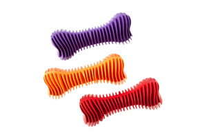 Thermoplastic rubber dog toy in bone shape cleans teeth