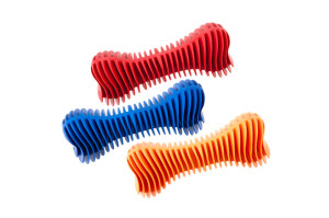 Chewing dog toy made from rubber that cleans teeth